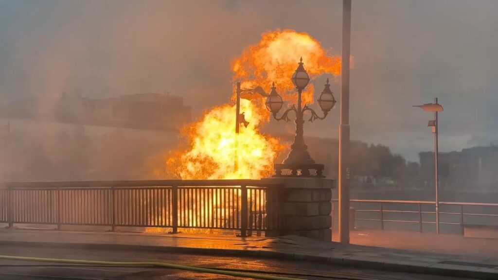 Firefighters bring blaze in Dublin’s docklands under control; Luas services remain disrupted