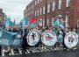 School secretaries and caretakers hold demonstration after beginning indefinite strike action