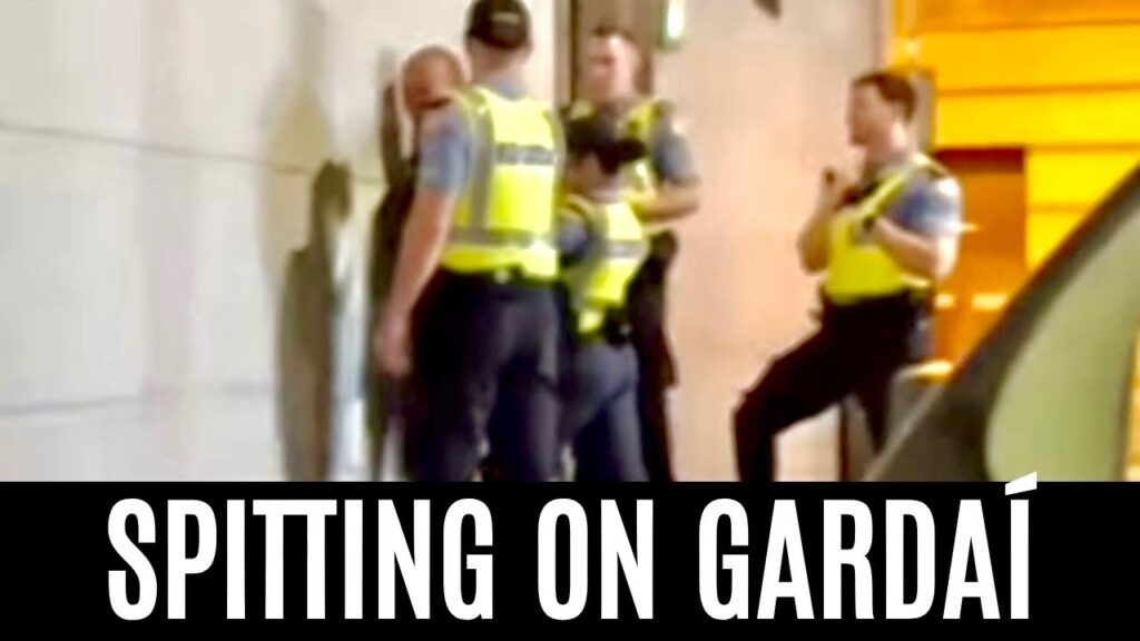 IRELAND – CRAZED MAN SPITTING ON GARDAÍ as he is arrested in DUBLIN