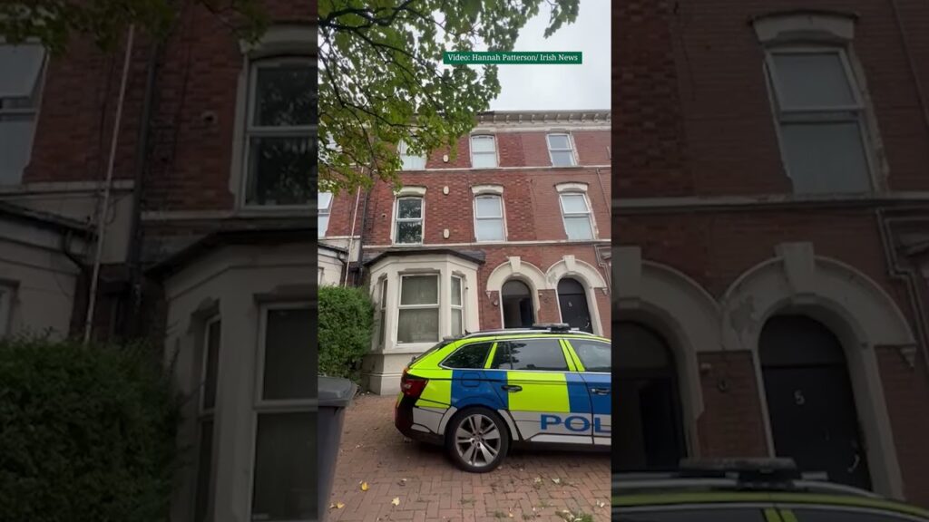 Police remain at the scene of a sudden death on Cliftonville Avenue in north Belfast