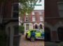 Police remain at the scene of a sudden death on Cliftonville Avenue in north Belfast
