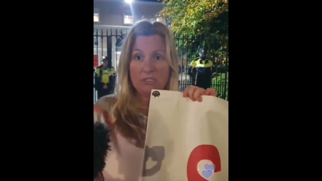 Saggart woman speaks to Philip Dwyer outside Citywest IPAS centre