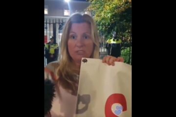 Saggart woman speaks to Philip Dwyer outside Citywest IPAS centre