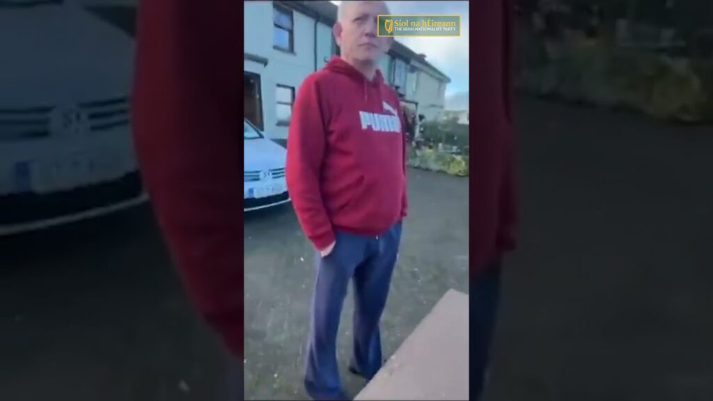 Irishman putting up Irish flags gets threatened with a hurley!