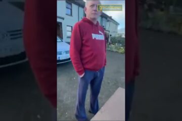 Irishman putting up Irish flags gets threatened with a hurley! Irishman putting up Irish flags gets threatened with a hurley!