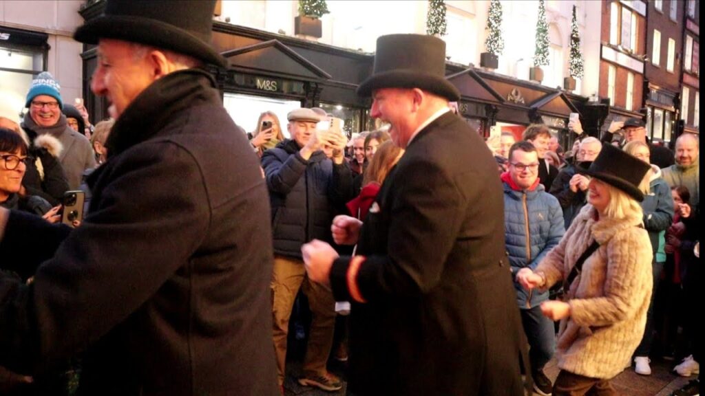 Brown Thomas Doorman (Sean Boland) Brings Grafton Street To A Halt With Some Christmas Hits